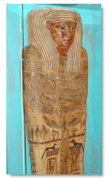 Photograph of an Egyptian sarcophagous displaying mytholgical and religious symbols.